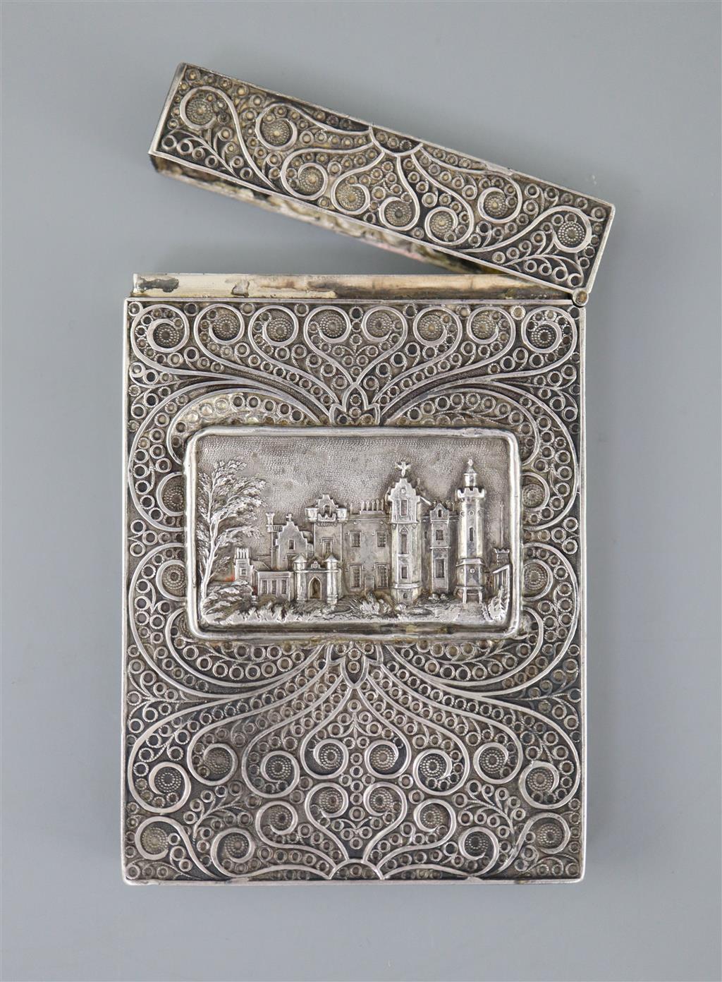 A William IV filligree silver rectangular card case, with inset panel embossed with scene of a stately home,